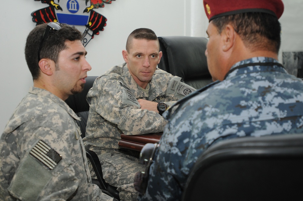 Red Falcons commander meets with local IP commander