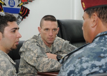 Red Falcons commander meets with local IP commander