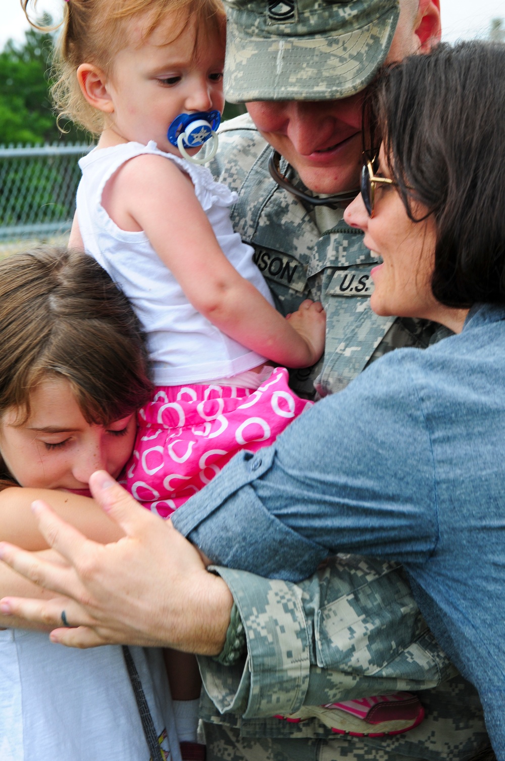 Family hug at Serving Our Troops - St. Paul to Fort McCoy Family hug at Serving Our Troops - St. Paul to Fort McCoy