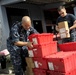 Sailors load supplies in Puerto San Jose