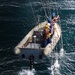 USS Ronald Regan sailors raise RHIB