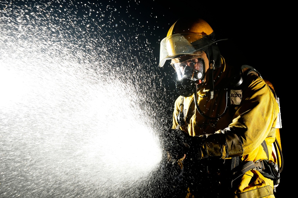 Sailor demonstrates firefighting techniques Sailor demonstrates firefighting techniques