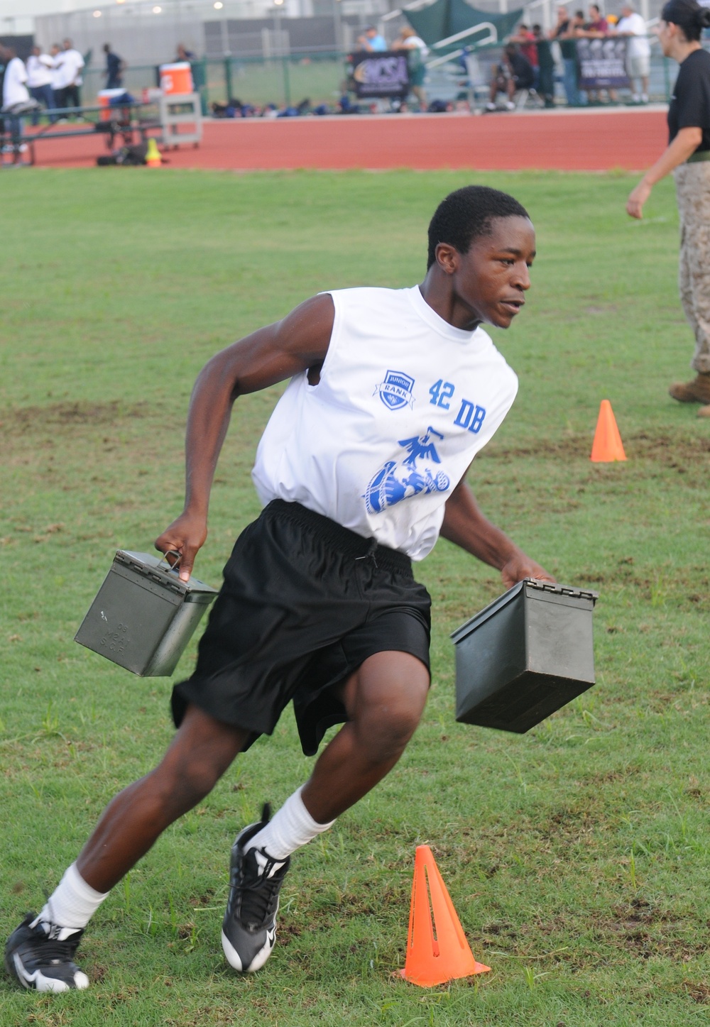 Marines movtivate local youth in Miami, during Junior Rank Football camp