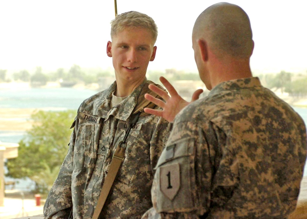 Footsteps in the sand: Father and son reunite in Iraq