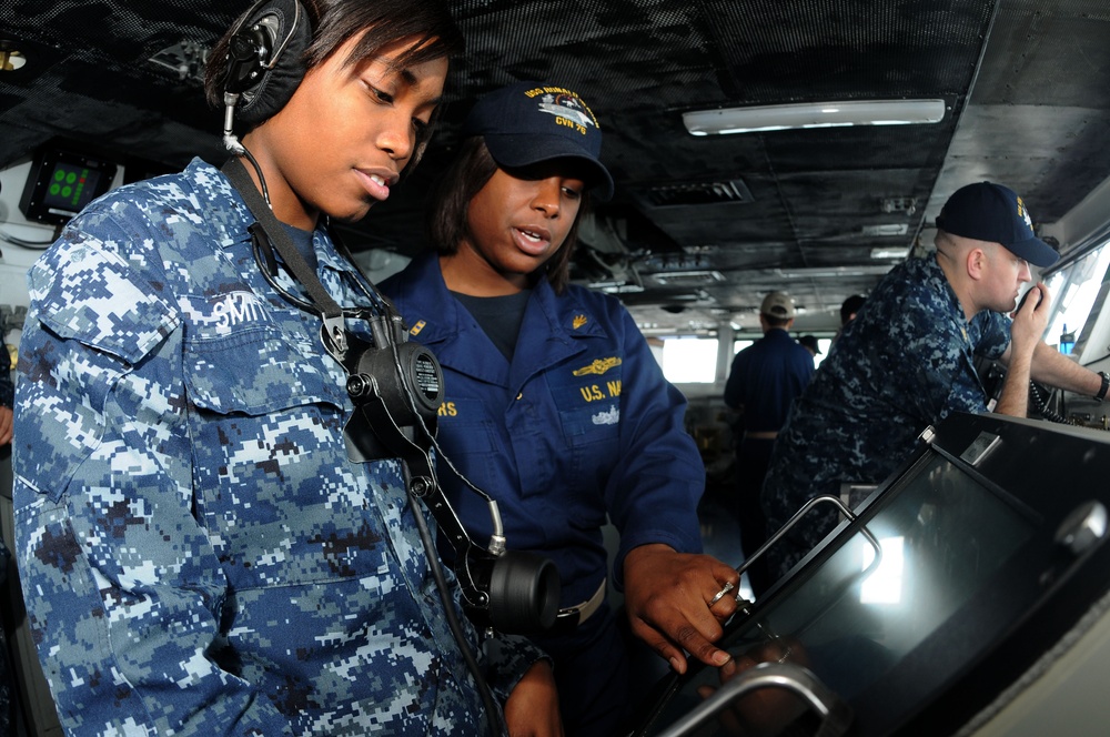 Officer observes sailor on USS Ronald Reagan bridge