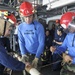 USS George Washington sailors perform a pipe patching drill