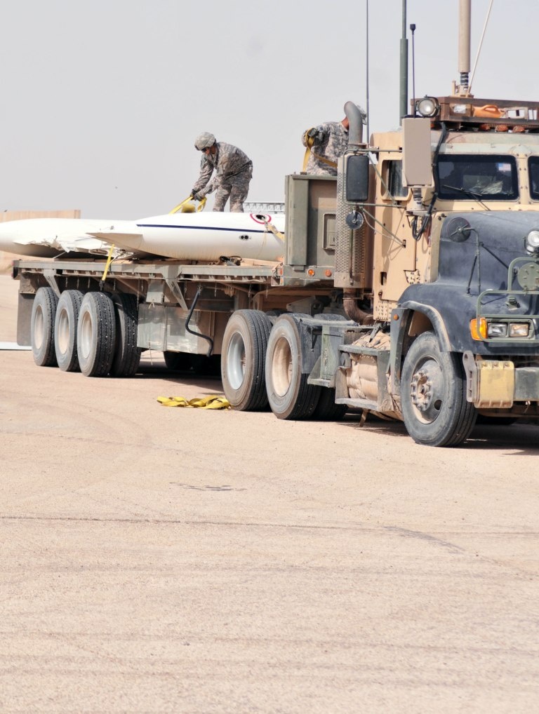 Soldiers and airmen recover, dismantle damaged aircraft