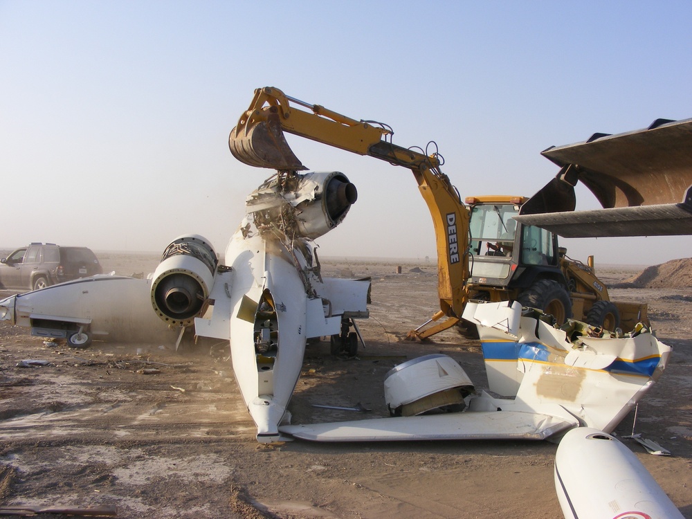 Soldiers and airmen recover, dismantle damaged aircraft