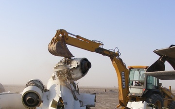 Soldiers and airmen recover, dismantle damaged aircraft