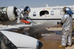 Soldiers and airmen recover, dismantle aircraft