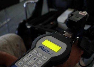 Some dogs are taught to fetch sticks; this Fido is taught to fetch bombs