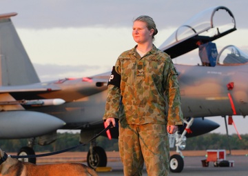 Australian military working dog teams provide security at RAAF Base Darwin during Talisman Sabre 2011