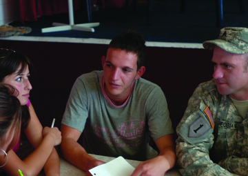 Soldier teaches local students English