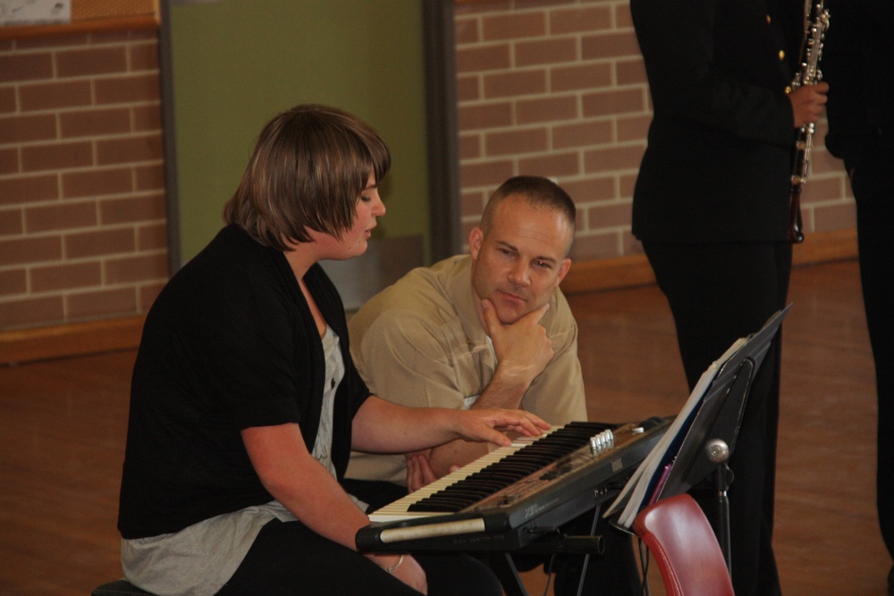 US 7th Fleet Band instructs piano student at Banora Point Primary School during Talisman Sabre 2011