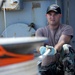 Navy diver aboard USNS Grasp