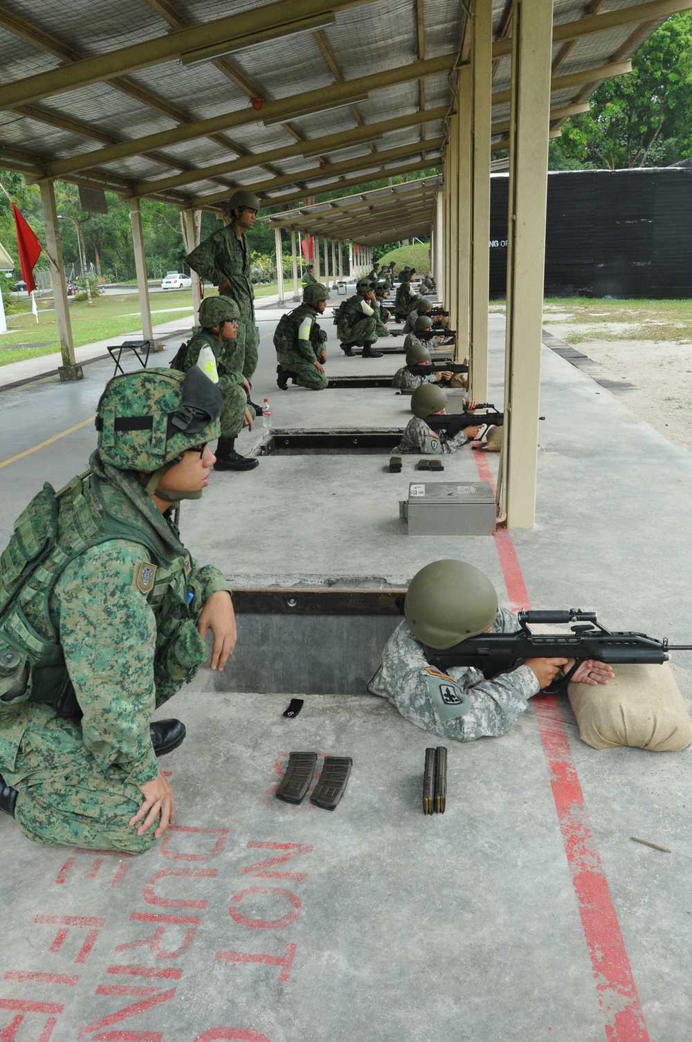 Cultural Exchange includes shooting Singapore's elite weapon