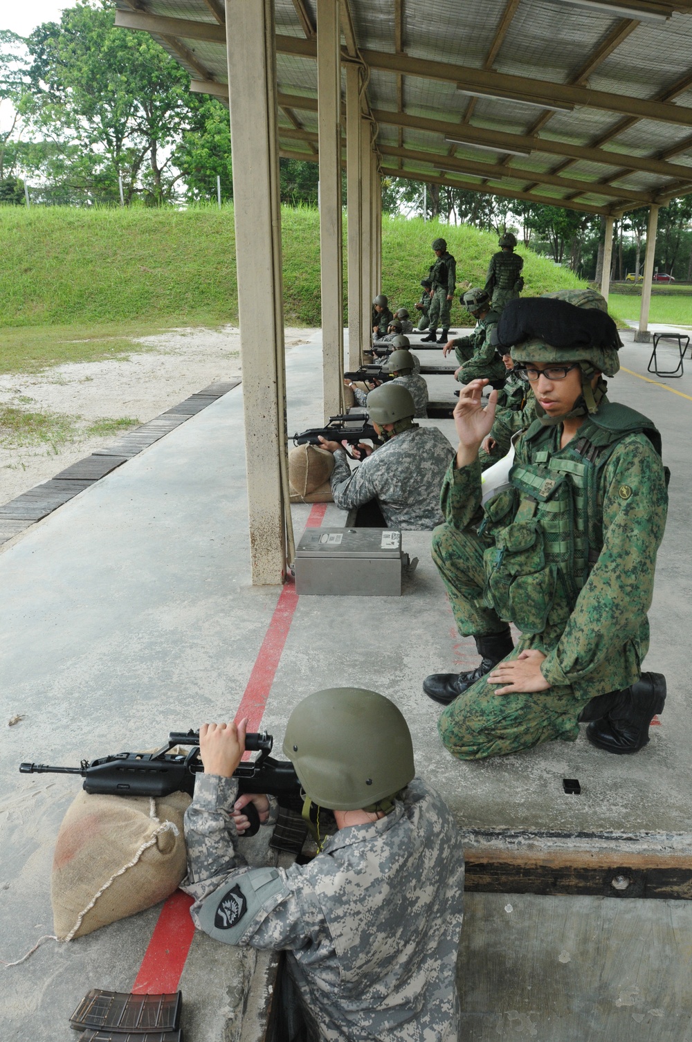 Cultural Exchange includes shooting Singapore's elite weapon