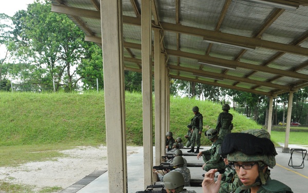 Cultural Exchange includes shooting Singapore's elite weapon