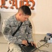 Information systems NCO provides technical support to Cavalry troopers in Iraq