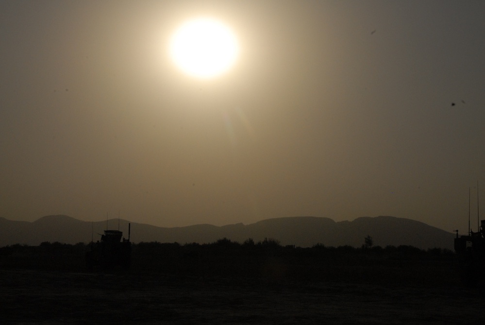 Sunset over troops