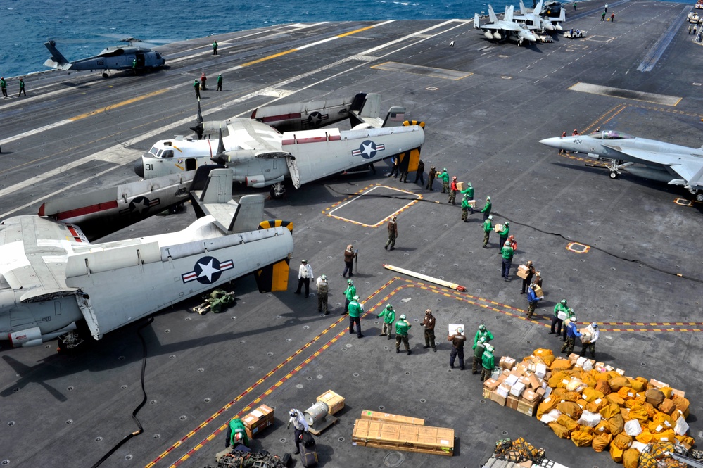 USS George Washingto sailors move mail