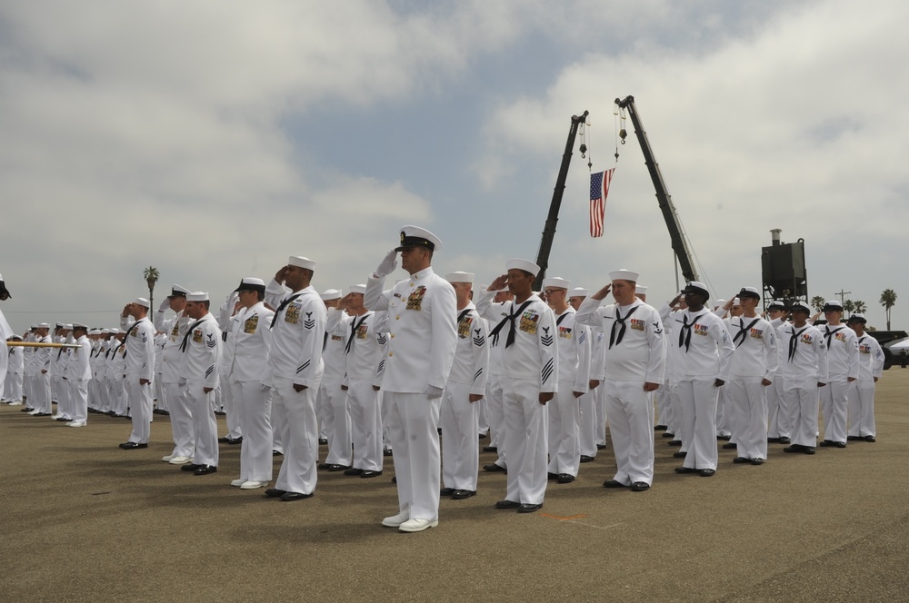 Seabee battalion saluting colors during a ceremony