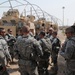 1st Battalion, 7th Field Artillery Regiment Soldiers prepare for a patrol with 1st Federal Police Division counterparts