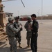 1st Battalion, 7th Field Artillery Regiment Soldiers prepare for a patrol with 1st Federal Police Division counterparts