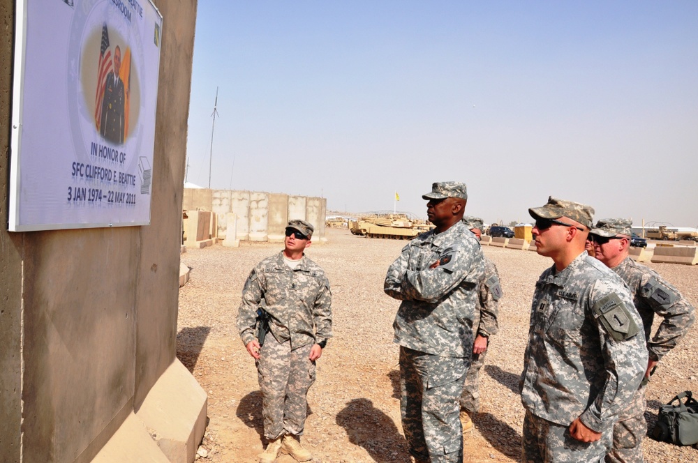 1st Battalion, 7th Field Artillery Regiment Soldiers prepare for a patrol with 1st Federal Police Division counterparts