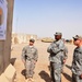 1st Battalion, 7th Field Artillery Regiment Soldiers prepare for a patrol with 1st Federal Police Division counterparts