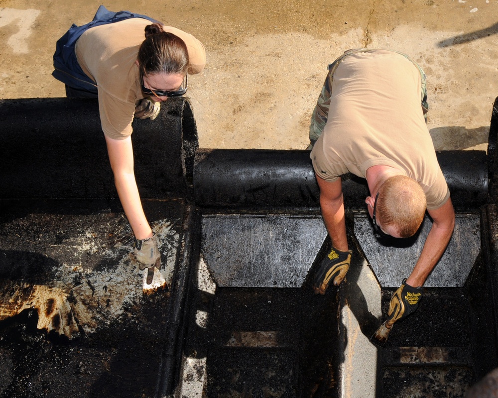 Naval Mobile Construction Battalion 74 maintains civil engineer support equipment