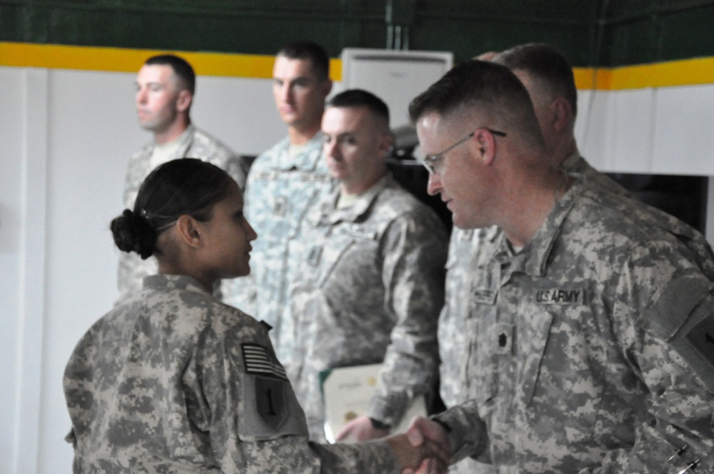 Soldiers with 1st Battalion, 63rd Armor Regiment, receive Army Commendation Medals for valor