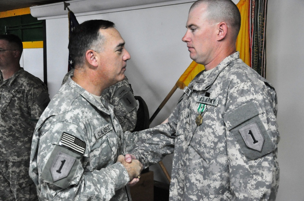 Soldiers with 1st Battalion, 63rd Armor Regiment, receive Army Commendation Medals for valor