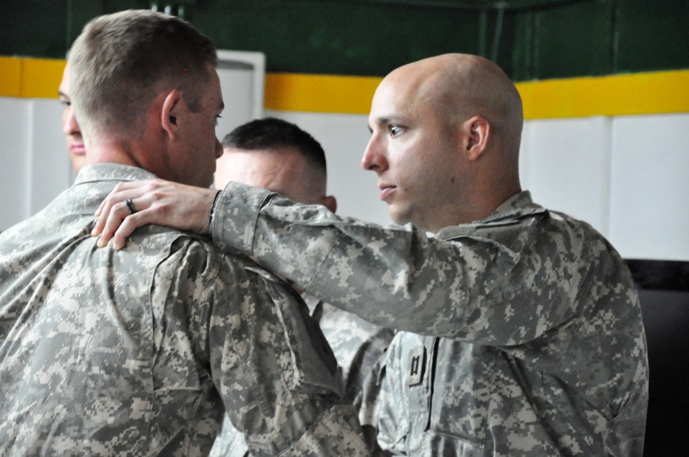 Soldiers with 1st Battalion, 63rd Armor Regiment, receive Army Commendation Medals for valor