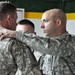 Soldiers with 1st Battalion, 63rd Armor Regiment, receive Army Commendation Medals for valor