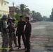 First Battalion, 7th Field Artillery Regiment, and 1st Federal Police Division counterparts patrol in Baghdad