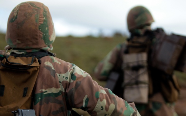 ‘Nobody told me the war wouldn’t be easy’: South African soldiers and U.S. Marines combine forces for simulated assault