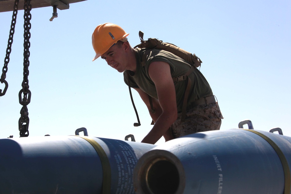 Ordnance Marines arm the air wing for operational success