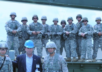 Horizontal and vertical Engineer Soldiers build training facilities