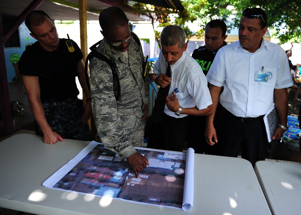 Officials review the layout of medical site