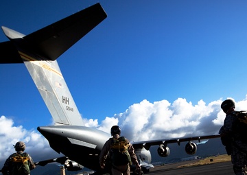 Parachutes over paradise: Force Recon Marines, SEALs, Army and Air Force paratroopers glide over Marine Corps Base Hawaii