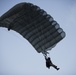 Parachutes over paradise: Force Recon Marines, SEALs, Army and Air Force paratroopers glide over Marine Corps Base Hawaii