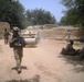 Doking mine-clearance vehicle patrols alongside Spartan soldiers