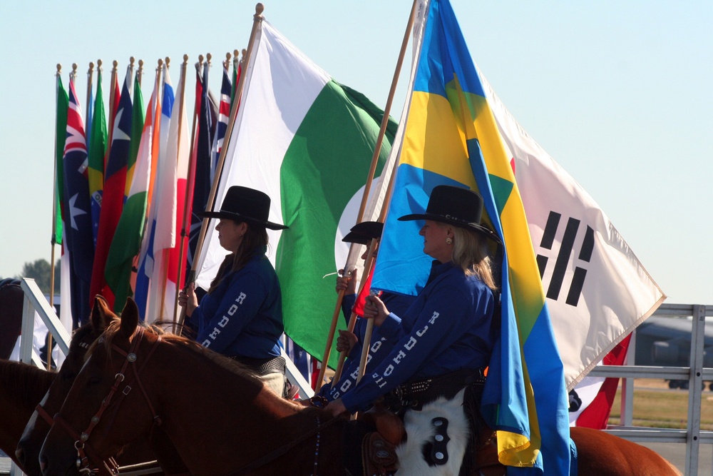 Rodeo 'cowgirls' carry international spirit during opening ceremony
