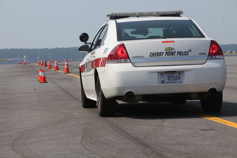 Military, civilian police officers whip through emergency vehicle operators’ training