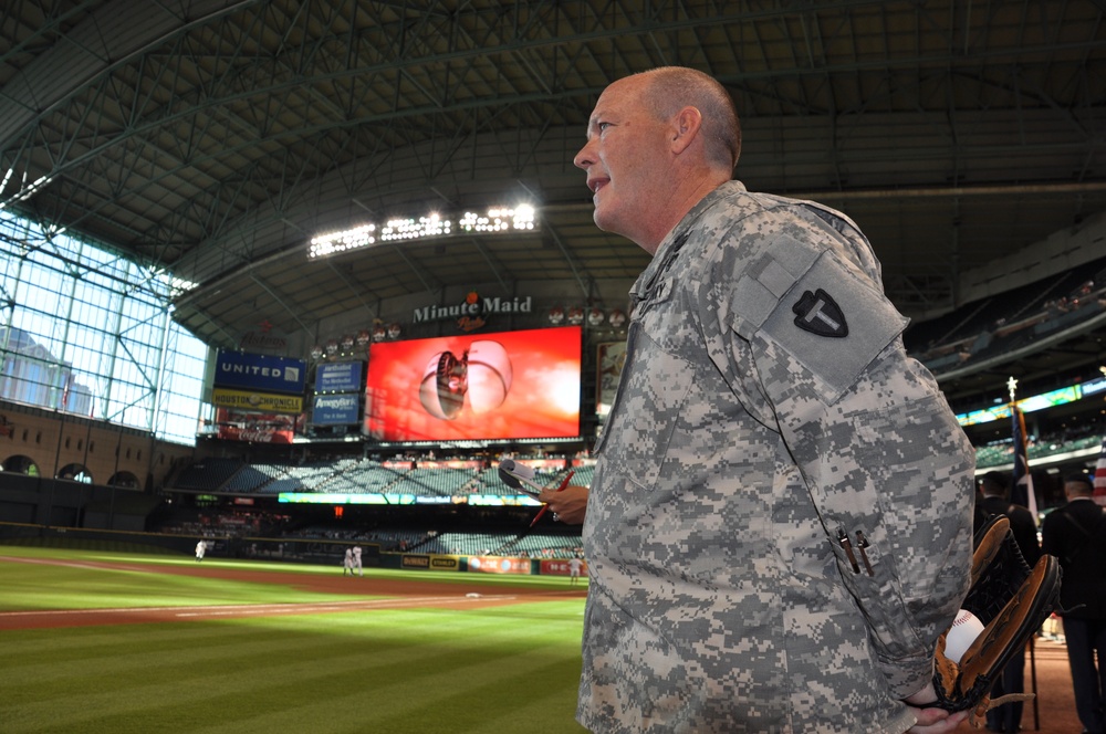 National Guard officer honored with first pitch