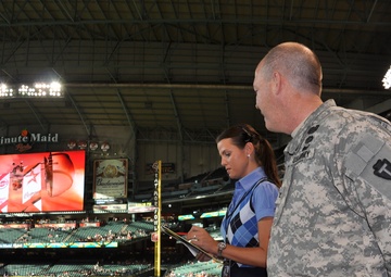 National Guard officer honored with first pitch