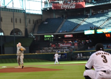 National Guard officer honored with first pitch
