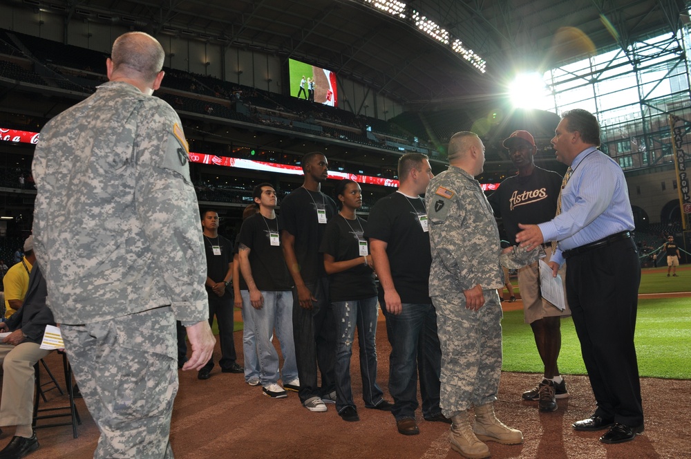 Guard recruits enlist at Major League Baseball game