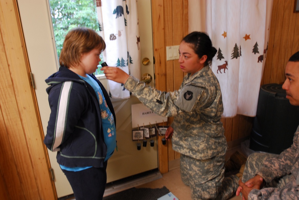 Aviators break from training to help disabled children